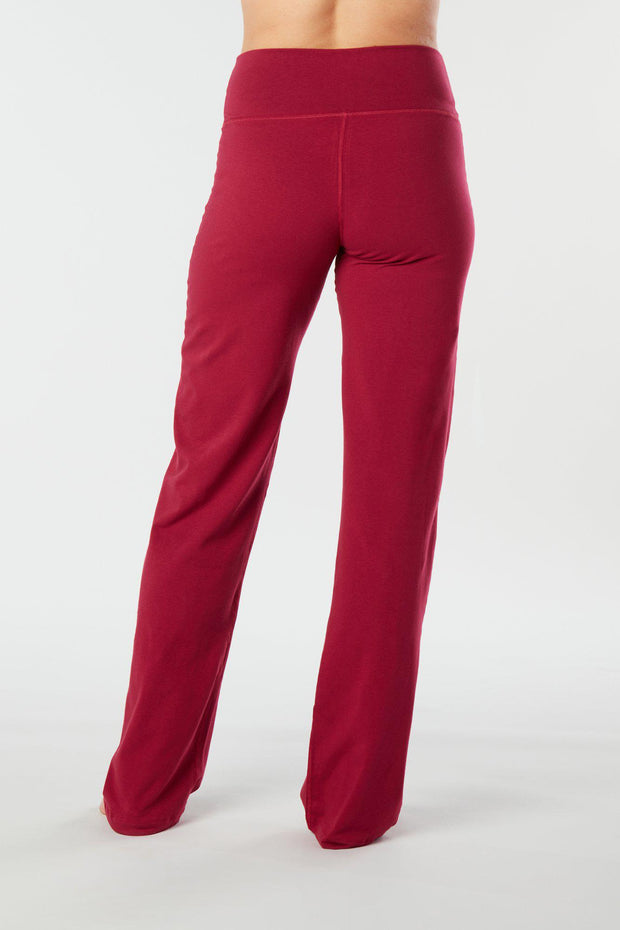 Woman's back facing legs showing pair of redorganic cotton Luana Pants yoga pants