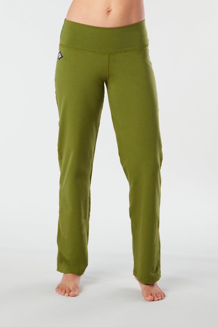 Woman's forward facing legs showing pair of lime green organic cotton Luana Pants yoga pants