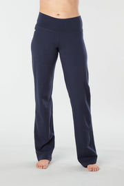 Woman's forward facing legs showing pair of Navy Blue organic cotton Luana Pants yoga pants