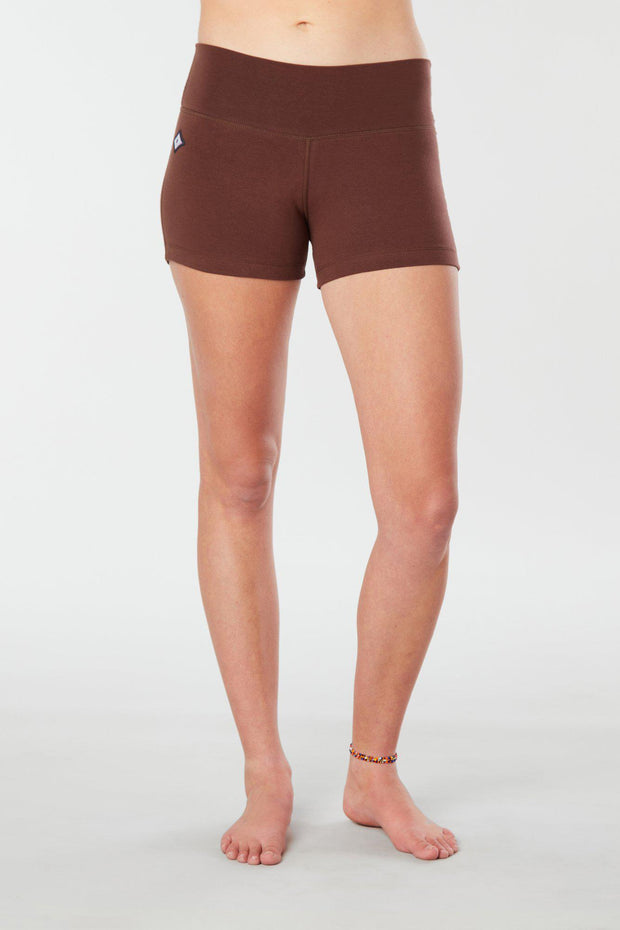 Woman legs front facing wearing matching brown colored organic cotton Luana Shorts 