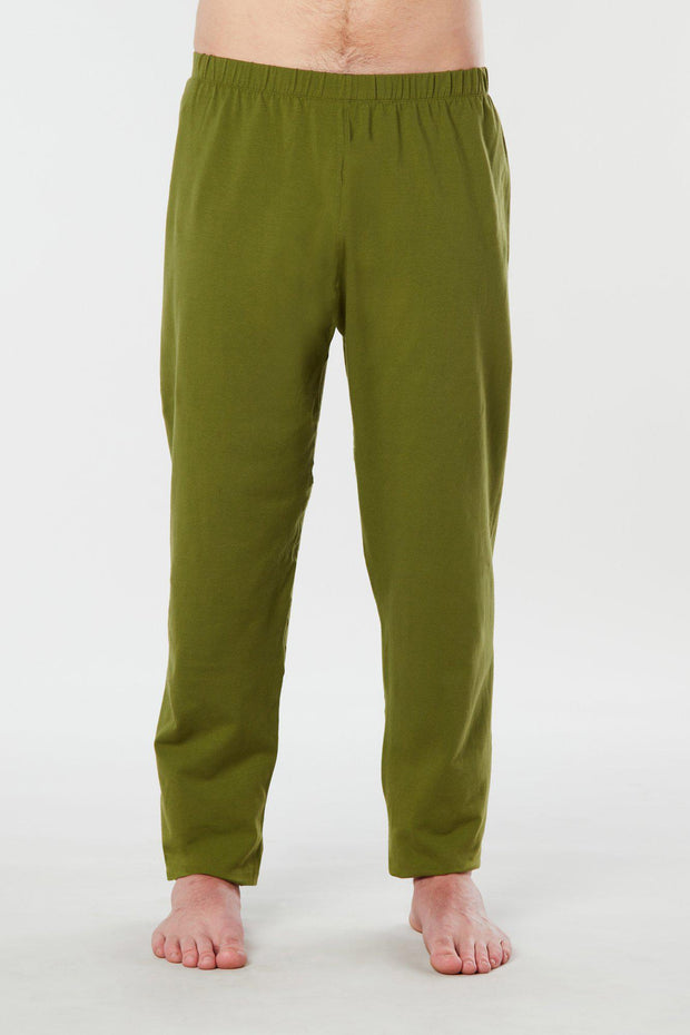 Man's legs facing forward view of lime green colored organic cotton Mana yoga pants