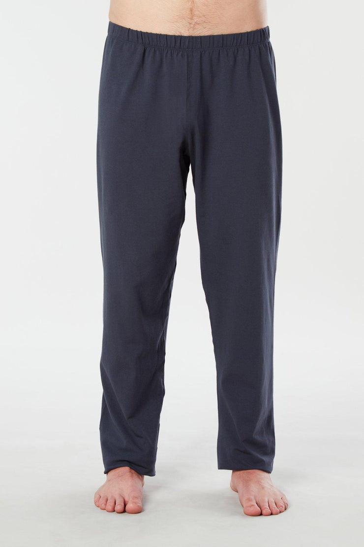 Man's legs facing forward view of navy blue colored organic cotton Mana yoga pants