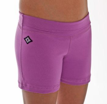Woman legs side facing wearing matching pink colored organic cotton Luana Shorts 
