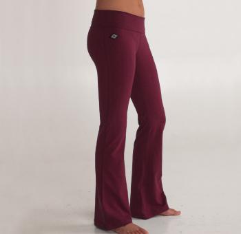 Woman's lower half facing sideways wearing maroon colored organic cotton Moana Yoga Pants
