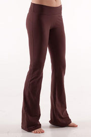 Woman's lower half facing sideways wearing brown colored organic cotton Moana Yoga Pants